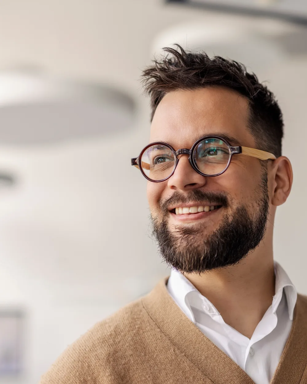 Smiling adult in a clean modern office setting