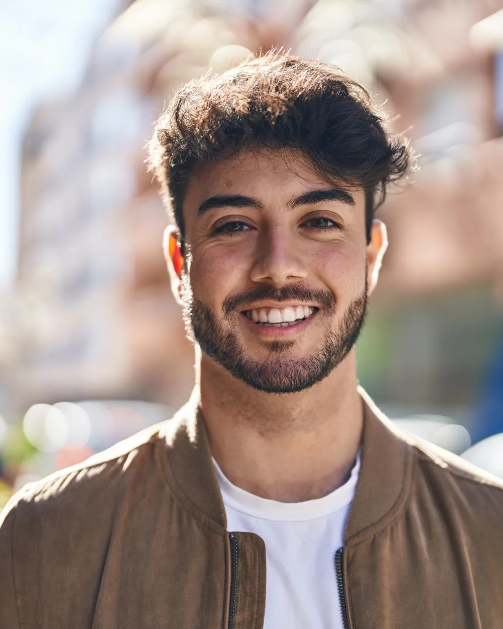 Smiling young man outdoors
